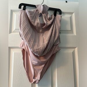 Lavender halter bodysuit.